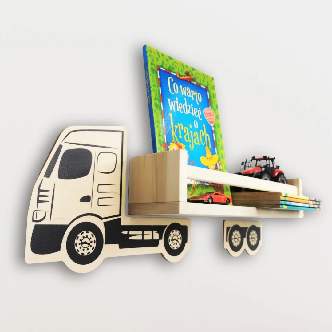 Półka w kształcie ciężarówki z książką i zabawkami.